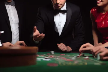 A glowing roulette wheel with cascading chips, symbolizing the engaging live and instant-win games available on CD444.